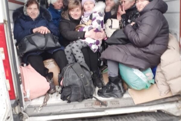 Randy Hacker - Danuta's full truck - 17 women and children